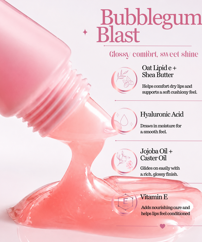 Pink Bubblegum Blast lip balm shown as a glossy translucent gel being poured from a pink bottle, with text callouts highlighting ingredients like oat lipid e, shea butter, hyaluronic acid, jojoba oil, caster oil, and vitamin E on a white background.