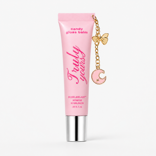 Truly Yours Bubblegum Blast, featuring a gold butterfly and moon charm, set against a clean white background.
