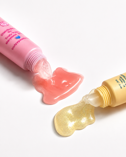Truly Yours Vanilla Butter and Bubblegum Blast Candy Gloss Lip Balm spilling over